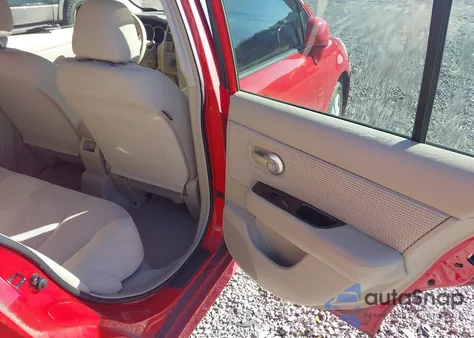 2010 Nissan Versa 1.8Sl z USA, uszkodzony, nr VIN 3N1BC1CP7AL393095